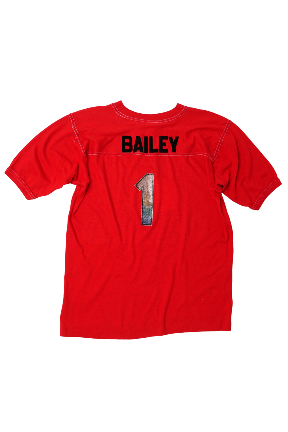 A red short-sleeve t-shirt shown flat against a white background, featuring the name 'BAILEY' in black block letters and a distressed black-and-white number '1' printed on the back.