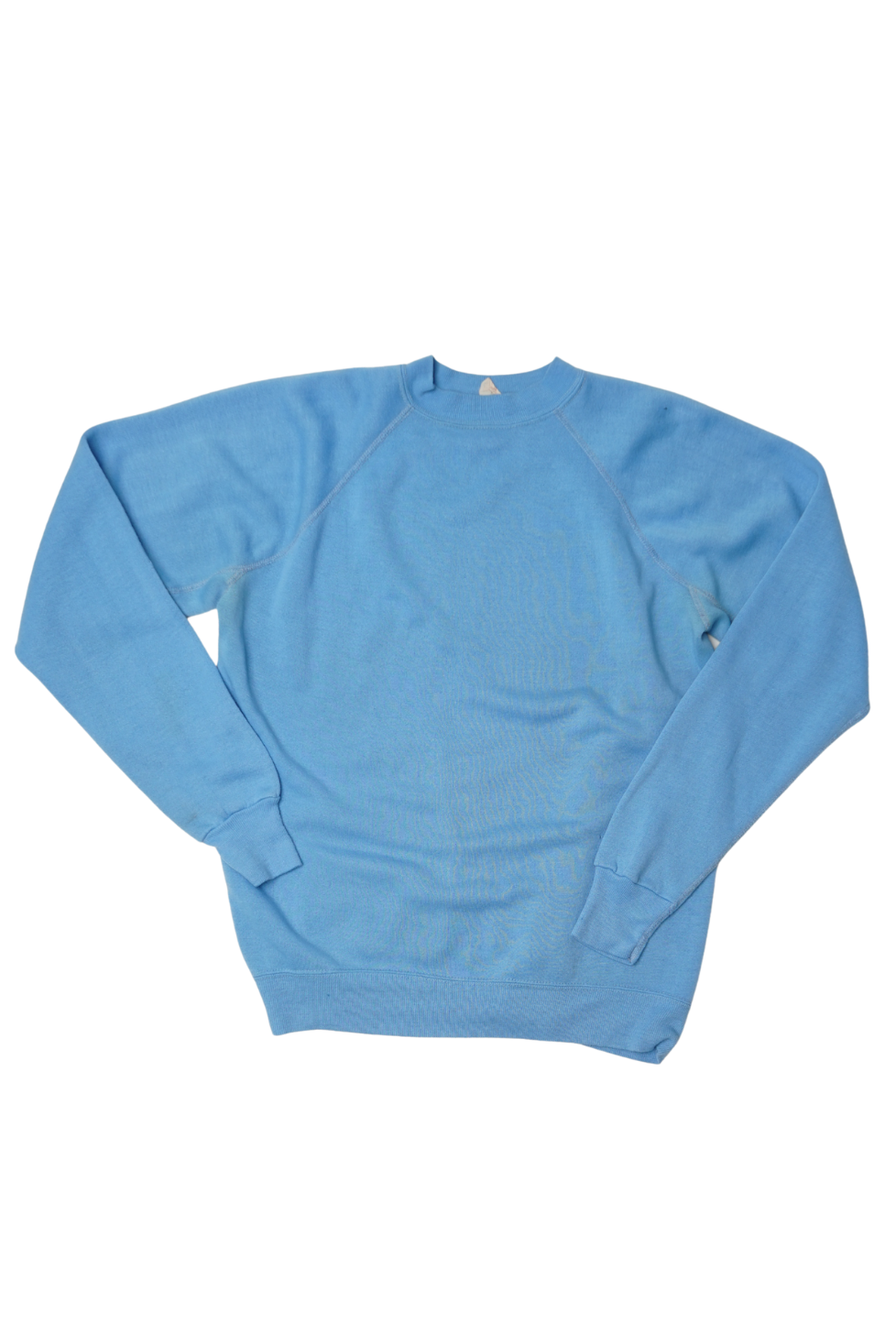 A light blue crewneck sweatshirt with raglan sleeves, laid flat against a solid white background.